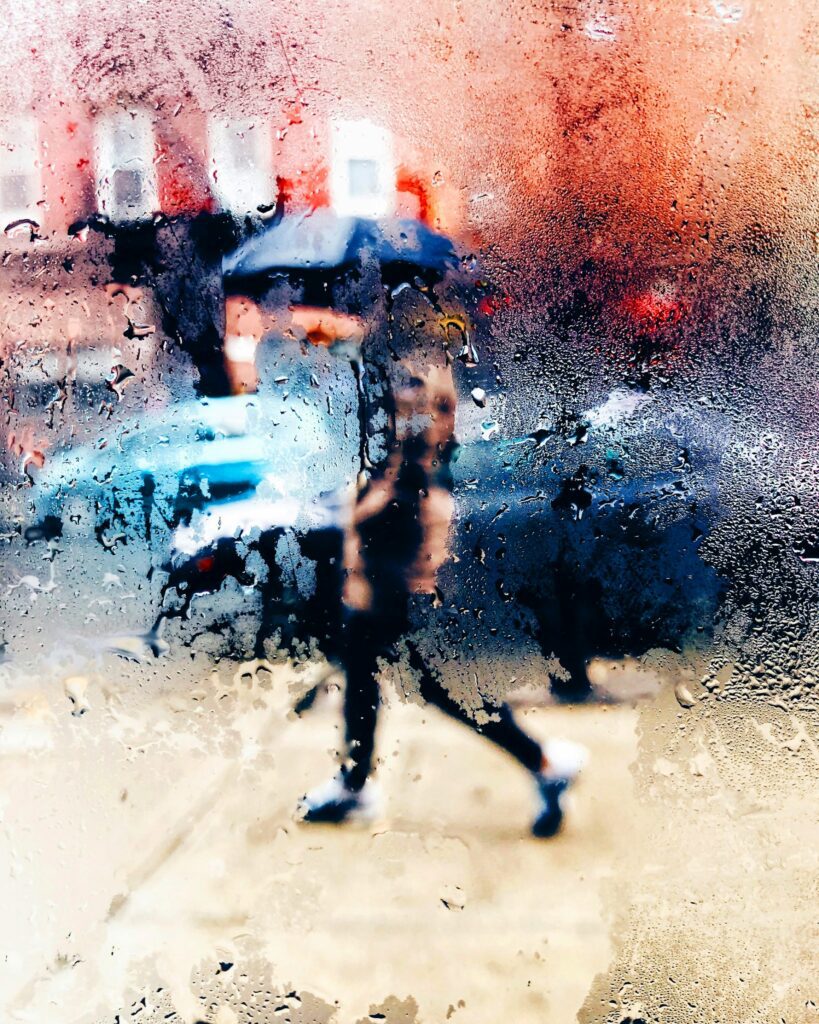 Rain on a window illustrating the need for condensation and mould prevention in student houses.